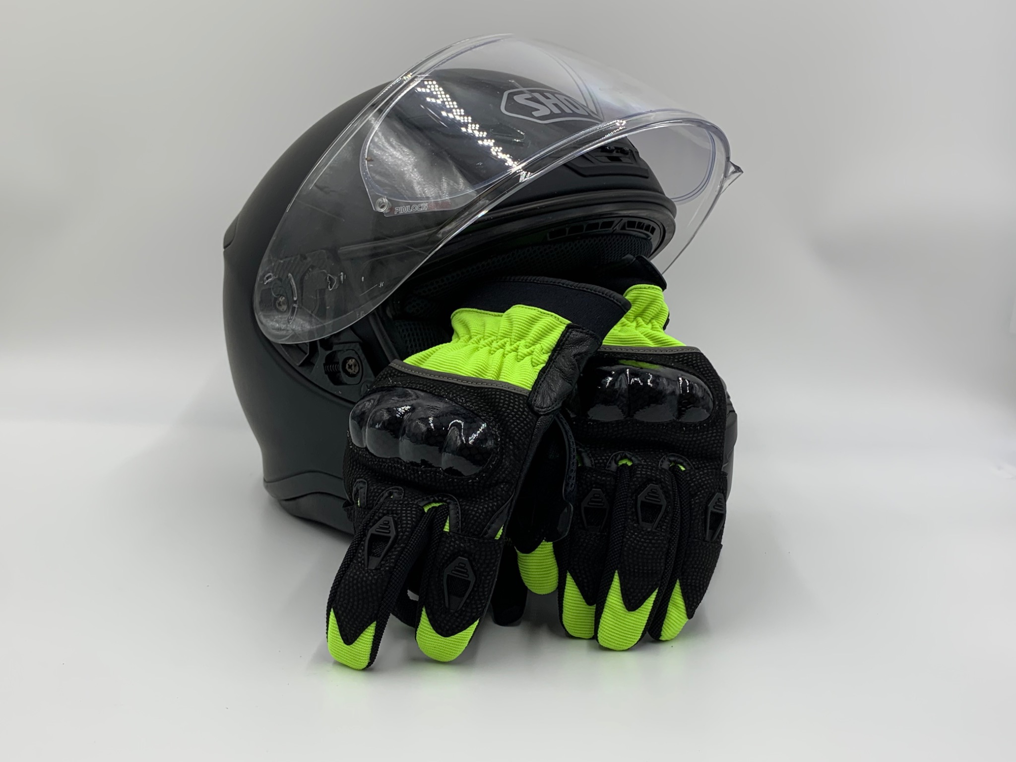 Black motorcycle helmet and gloves